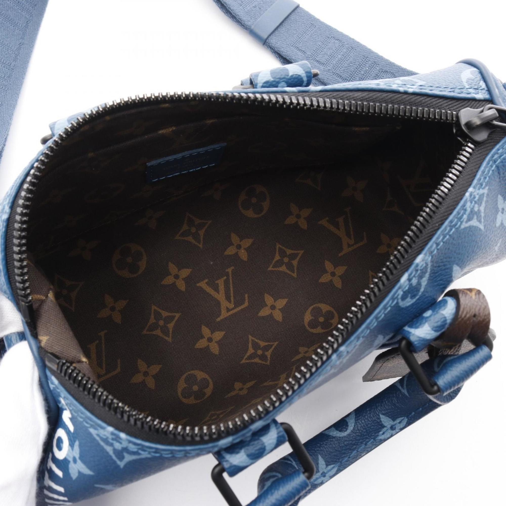 Louis Vuitton Keepall bandoulière 25 – The Closet Trading