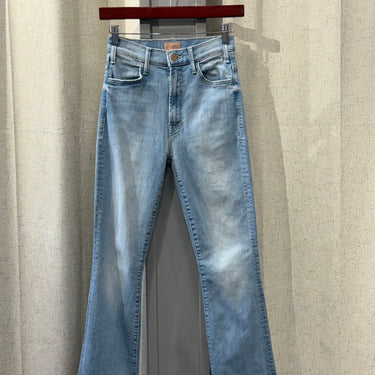Mother light wash kick flare jean